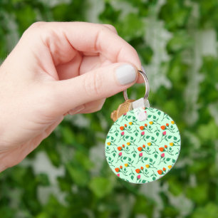 Blommönster med blommor från färgad ro nyckelring