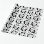 Blommönstret Monogram G initial Black and White Presentpapper<br><div class="desc">Papper omslutning av Monogram G-Blommönstret för inledande svartvitt kan anpassas med en bild,  namn,  text,  logotyp eller foto. Byt vit bakgrund till en blå nyans,  grönt,  gult,  orange,  rosa,  röd,  brun och lila. Underbar för att stänga jul-,  födelsedag-,  babydusch- eller bröllopsgåvor.</div>