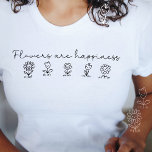 Blommor är lyckliga, kvinnligt modernt, minimalist t shirt<br><div class="desc">Perfektens gåva till din bästa vän,  dotter eller flickvän som kärlek blommar och lycka. Utformningen har fem söta leende blommor med texten "Blommor är lyckliga" i en enkel konst i stil. Minimalistisk modernt femininindesign i snyggten. Photo kredit: Släpp etikettrörelsen</div>