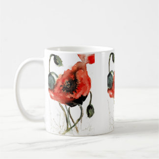 Blommor av rödfärgad vallmofrö av artsam kaffemugg