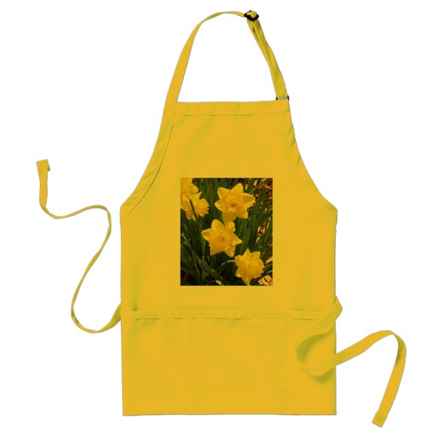 BLOMMOR GULNAR PÅSKLILJAFÖRKLÄDET FÖRKLÄDE (Framsidan)
