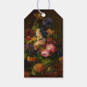 Blommor och ananas på en entablement presentetikett