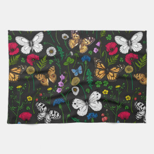 Blommor och fjärilar av vild på svart kökshandduk