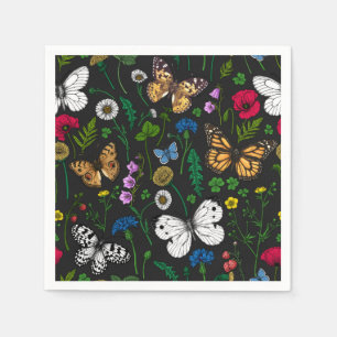 Blommor och fjärilar av vild på svart pappersservett