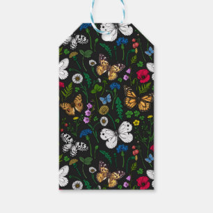 Blommor och fjärilar av vild på svart presentetikett