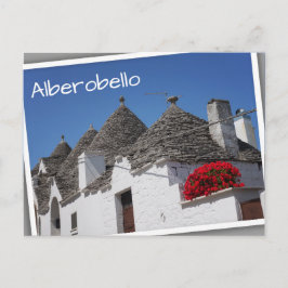 Blommor och trullhus i Geranium i Alberobello Vykort