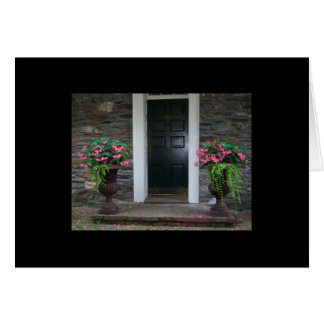 Blommor vid dörren hälsningskort