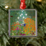 Blomsterträdgård | Gustav Klimt Julgransprydnad Metall<br><div class="desc">Blomsterträdgården (1905-1907) av den österrikiske konstnären Gustav Klimt är ett svidande mästerverk i tidigt 1900-talskonst. Denna lush, imponerande scen spricker med färgstarka blommar i ett meriderande naturteori som återspeglar Klimts dekorativa stil och kärlek för blommigtens motiv. Målarens rik struktur och komplicerade detaljer gör det till ett tidslöst val för bra...</div>