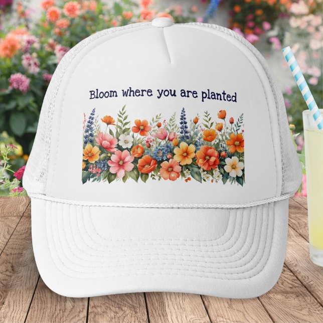 Blomstra Där Du Är Planterad Blommig Keps (A baseball cap for gardeners with colorful floral design and caption 'Bloom where you are planted')