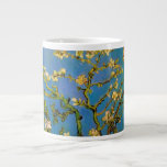 Blossoming Almond Träd av Vincent van Gogh Jumbo Mugg<br><div class="desc">Blossoming Almond Träd av Vincent van Gogh är en vintage bra konst post impressionism som fortfarande målar upp blommigten med blommor på grenarna av en mandel träd i en trädgård. Blå himmel ligger i bakgrunden. Om konstnären: Vincent Willem van Gogh (1853-1890) var en av de mest berömd Post impressionist-målarna under...</div>