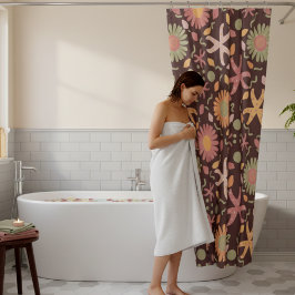 Blötblommor och stjärtfiskar på chokladbrun