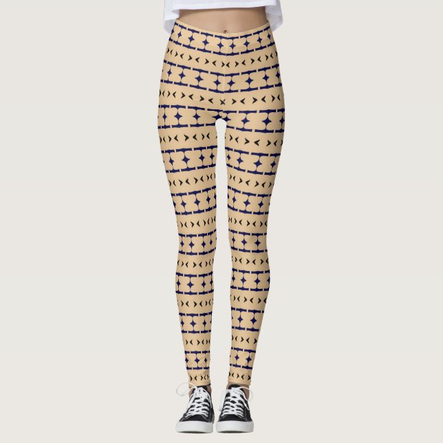 Blue and black tribal patterns on khaki coloured leggings (Framsida)