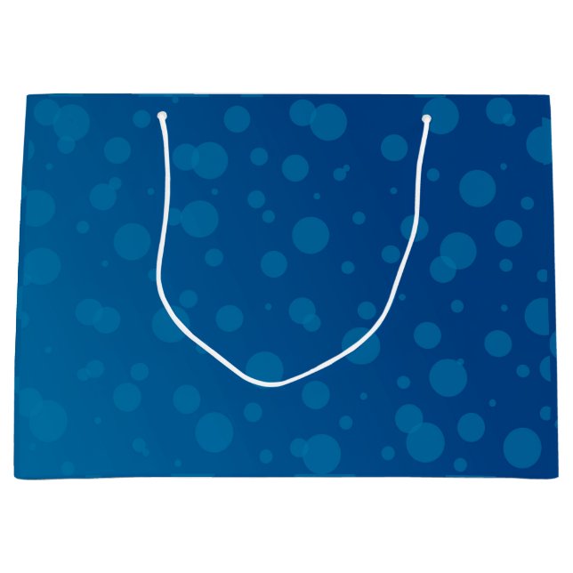 Blue gift bag with white polka dots (Framsidan)