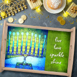 Blue Hanukkah Menorah Live Kärlek Gnistra Shine Serveringsbricka<br><div class="desc">"Levande kärlek gnistra skiner." Ett närliggande foto av en ljus, färgstark, blå och grönt artsy-menorah hjälper dig in i helgdag av Hanukkkah i stil. Känn julhelgens värme och glädje när du användor den här fantastiska, färgstarka servettrören för Hanukkah-trä. Den här serveringsbrickan består av två storlekar, små och stora, samt ditt...</div>