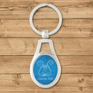 Blue Lyre Background Ovalt Silverfärgad Nyckelring