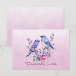 Bluebirds vid Rosa av blommor