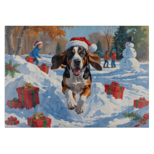 Bluetick Coonhound springer i snö med jul