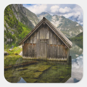 Boathouse i Obersee sjö i Tysklandare Alpernor Fyrkantigt Klistermärke
