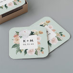Boho Blooms Modern Blommigt Bröllop Monogram Underlägg Papper Kvadrat<br><div class="desc">Boho chic bröllop underläggs har en kvadratisk vattenfärg gräns av sage grönt botaniskt blad och jordade färgtoner i persiko-,  elfenben- och vita nyanser som formar initialer eller monogram och händelsemedatum i modern skrift. Designad att samordna med vår Boho Blooms bröllop och händelseinsamling.</div>