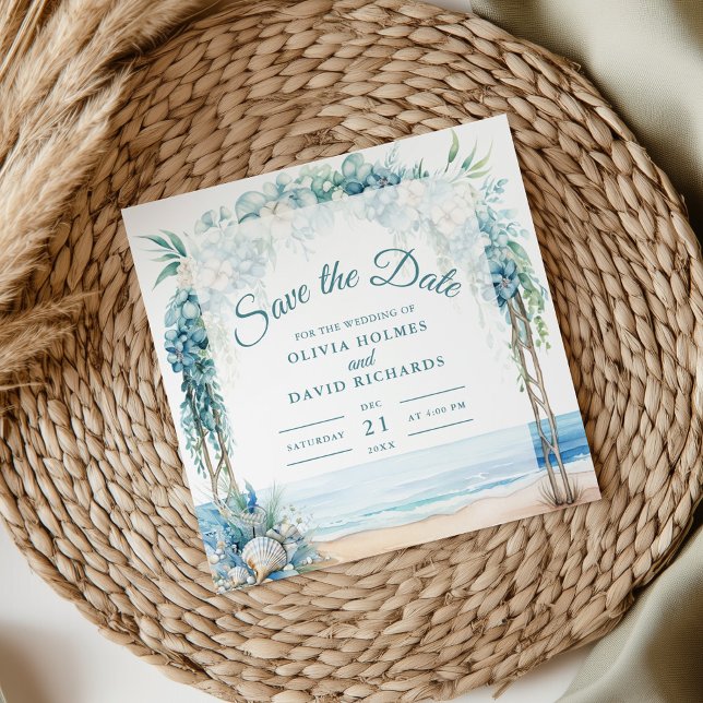 Boho Kustnära Blommig Båge Bröllop Spara Datum Datumet (Boho Coastal Floral Arch Wedding Save the Date on a neutral boho wedding table with pampas grass)