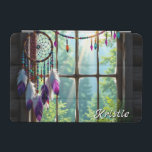 Boho Purple Dreamcatcher in Window  Personalized iPad Mini Skydd<br><div class="desc">Personalized iPad cover. A rustic window with a purple feathered dreamcatcher hanging in the window along with colorful sparkly crystals. The window overlooks a beautiful array of trees and sunbeams shining through.</div>