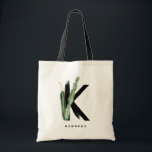 Boho Succulents Brev K Monogram Bridesmaid Tygkasse<br><div class="desc">Anpassade brev K monogram till väska med vattenfärgsuckor,  faux guld foil löv och svarta vattenfärgshålstensaccenter. Anpassa den här självbelåtna väskan genom att lägga till ditt namn eller annan information. Denna boho brev K-monogrampåse blir perfekt som gåva. Andra brev finns tillgängliga.</div>