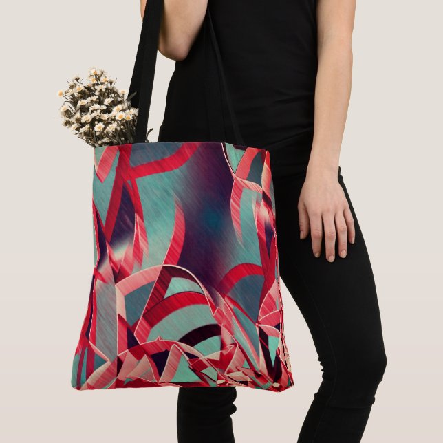 Böjd röd rosett band över blåaktigt grått tygkasse (Närbild)