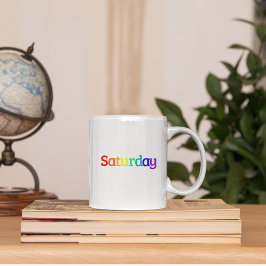 Bokningsdesign "lördag" i Regnbåge Färg Kaffemugg