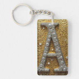 Bokstaven A med juveler på gul mosaikbakgrund