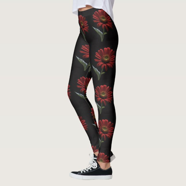 "Bold Beauty: A Single Red Daisy on Black" Leggings (Vänster)