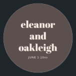 Bold Typography Warm Brown Modern Custom Wedding  Runt Klistermärke<br><div class="desc">This round wedding sticker in brown features clean serif typography with the couple’s names and date on a rich neutral background. A simple,  modern option for sealing envelopes,  favors,  or packaging on your wedding day. Personalize the names and date to match your celebration.</div>