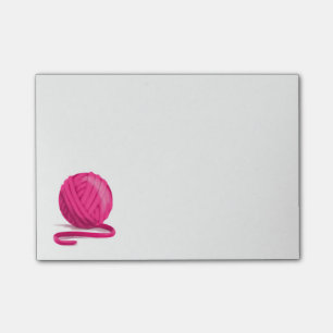 Boll av rosa garn post-it block
