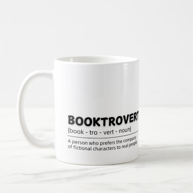 Booktrovert: Fiction over Reality Mugg (Vänster)