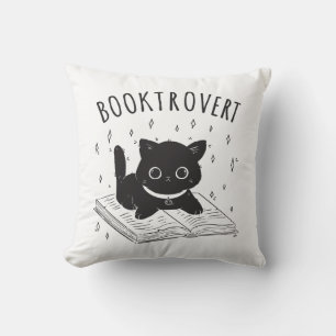 Booktrovertkatt med bok och stjärnor kudde