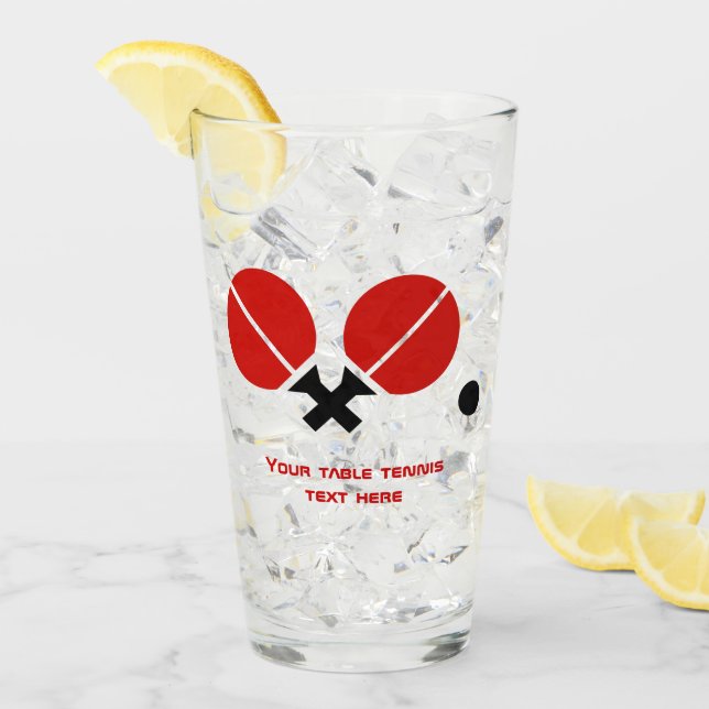 Bord tennisracketar och boll i svart, rött glaskopp (Framsida Ice)