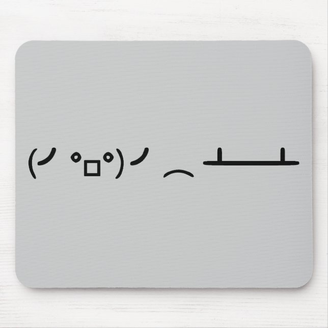 BordFlip som bläddrar ASCII-emoticonen Musmatta (Framsidan)