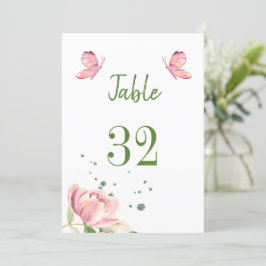 bordsnummer av shock rosa blommor, grönsaksfjärila