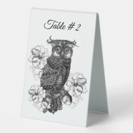 Bordsnumret mellan vackra Uggla och Orchids