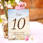 Bordsnumret Tropical Beach Wedding Bordsnummer<br><div class="desc">Ange perfektens tropiska ambians för bröllop med vår unika Anpassningsbar Starfish och Snäcka Tropical Beach Wedding Bordsnummers. Varje bordsnummer är designat med kärlek av Mylini Design och utstrålar en färsk havsvib. Konstruktionen har en charmerande stjärnfisk som vilar på en sandstrand, perfekt fångar ett tropiskt paradis fridhet och skönhet. Om du...</div>