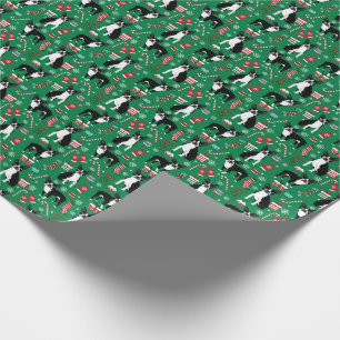 Boston Terrier Jul-hund som omsluter papprare Presentpapper