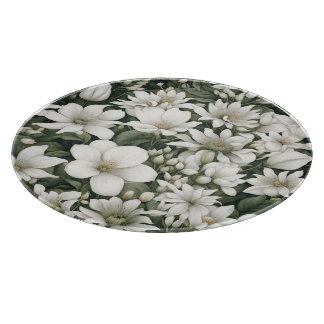 Botaniska vita blommor på grönt löv