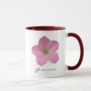 Botaniskt rosa pelargonblommafoto med namn mugg