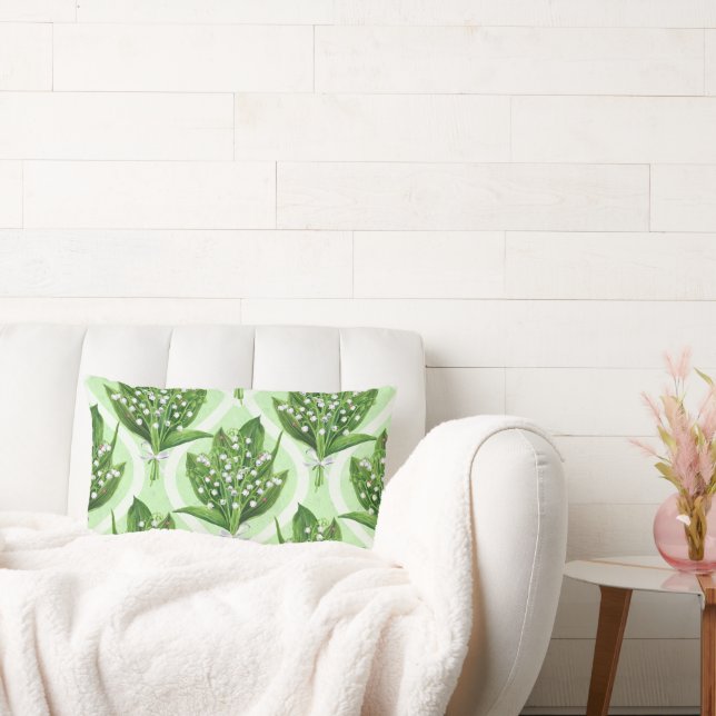 Bouquet lilly av dalen blommor på grönten lumbarkudde (Soffa)