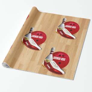 Bowlingklotet skor och klämmer fast med ditt presentpapper