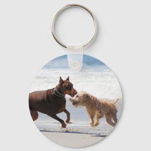 BoxareDoberman - lek daterar på stranden Nyckelring