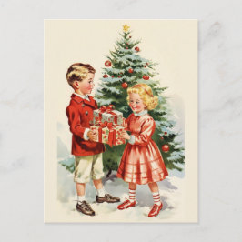 Boy and girl giving each other Christmas presents Vykort