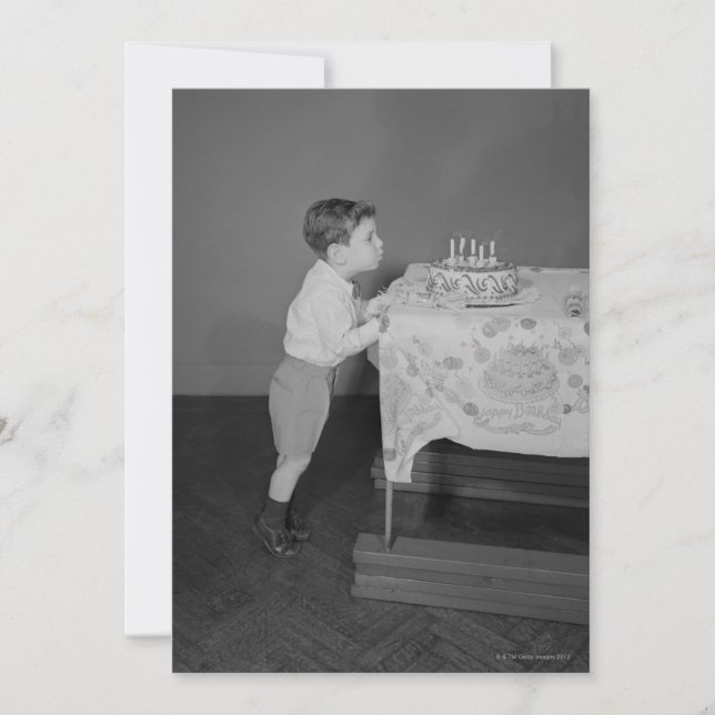 Boy Blowing Candles (Framsida)