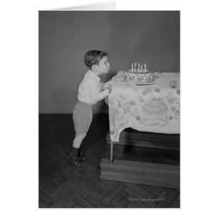Boy Blowing Candles Hälsningskort