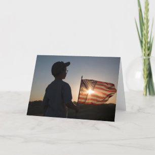 Boy Scout Holding USA flagga Kort