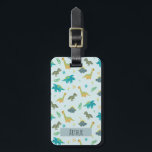 Boys Cute Blue Dinosaur Mönster Namn Kids Bagagebricka<br><div class="desc">Den här söta och moderna bagagetaggen för barn har en dinosauer tecknad mönster,  med t-rex,  stegosaurus och Jurassic-djungelväxter,  och kan vara personlig med dina pojkar namn och kontaktuppgifter. Den perfekt blå dinosaurietemerade presenten för baby,  småbarn eller barnets första resa. Kolla in vår samling för passet fodral.</div>
